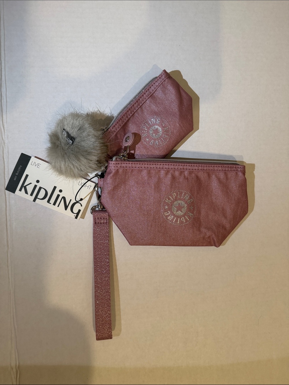 Kipling Rose Pink Double Pouch Wristlet with Pom Charm